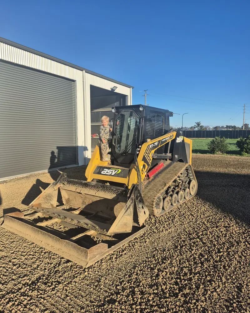 TNO Plumbing & Excavation skid steer on site
