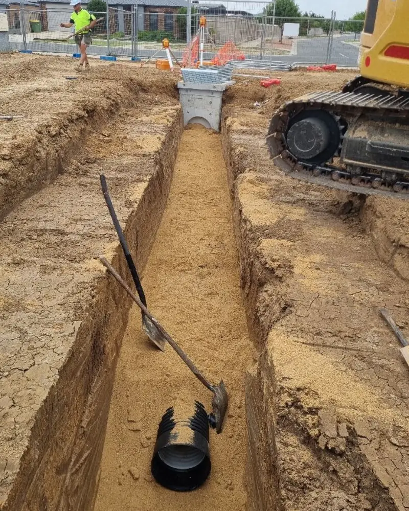 Site cut and trenching with excavation machinery